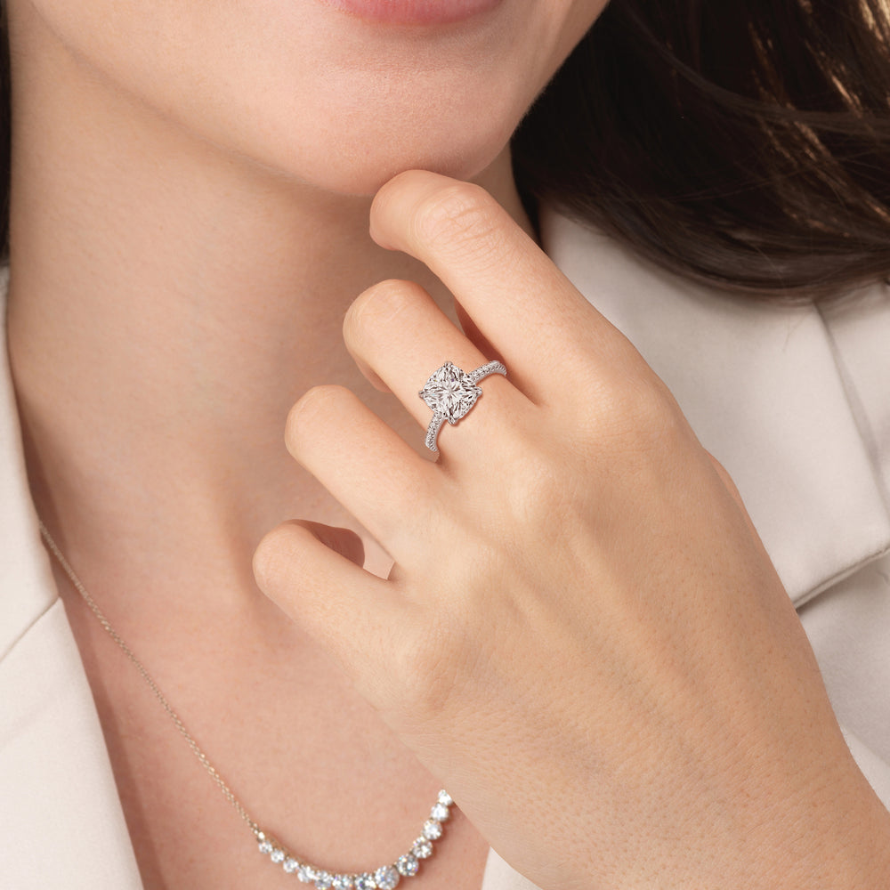 hidden halo and pave diamond engagement ring